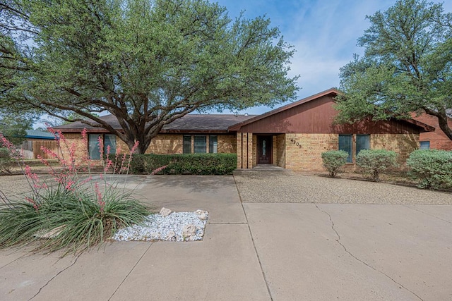 4203 Skyline Dr, Midland, TX 79707 - view of front of property featuring brick siding and driveway