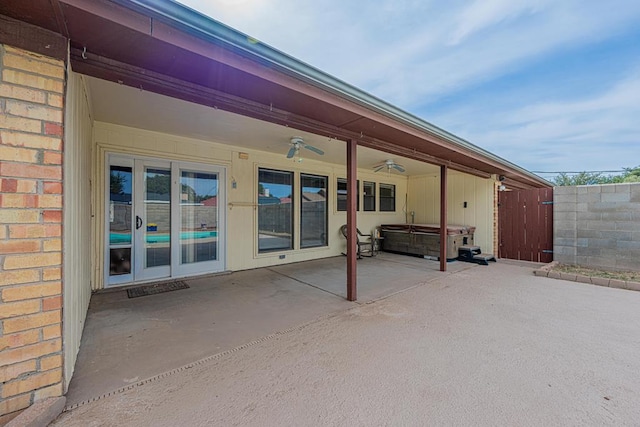 4203 Skyline Dr, Midland, TX 79707 - view of patio / terrace with a hot tub and ceiling fan