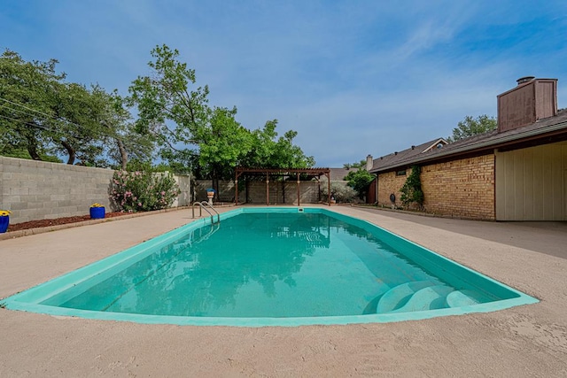 4203 Skyline Dr, Midland, TX 79707 - view of pool with a pergola, a fenced backyard, and a patio area