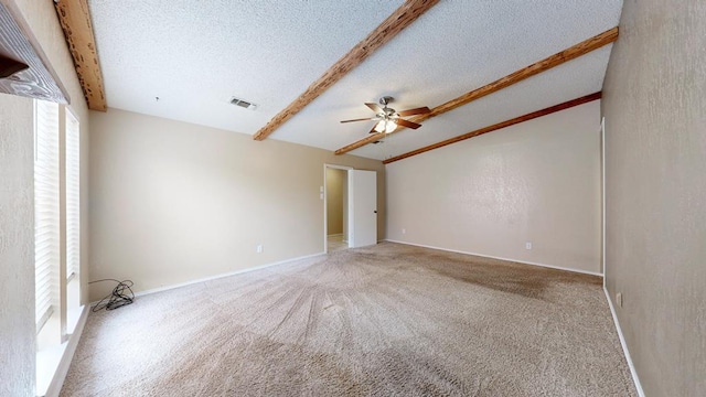 4203 Skyline Dr, Midland, TX 79707 - carpeted empty room with plenty of natural light, a ceiling fan, a textured ceiling, and baseboards