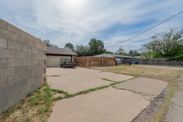 4203 Skyline Dr, Midland, TX 79707 - fenced backyard with a patio