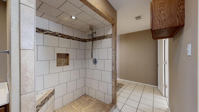 4203 Skyline Dr, Midland, TX 79707 - full bath featuring tiled shower and tile patterned flooring