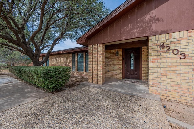 4203 Skyline Dr, Midland, TX 79707 - property entrance featuring brick siding