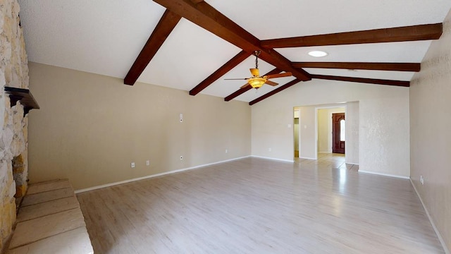 4203 Skyline Dr, Midland, TX 79707 - unfurnished living room featuring light wood finished floors, a ceiling fan, baseboards, and a fireplace
