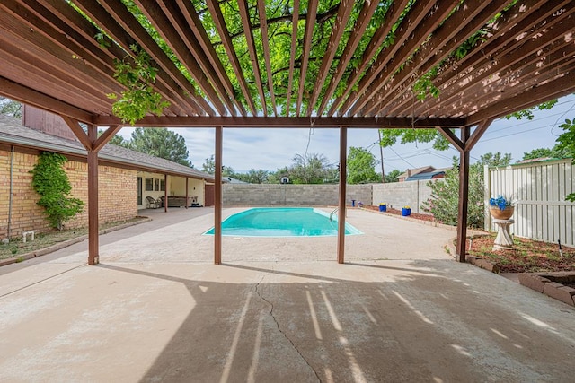 4203 Skyline Dr, Midland, TX 79707 - view of swimming pool featuring a patio and a fenced backyard