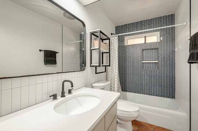 bathroom with vanity, toilet, tile walls, tile patterned floors, and shower / bath combo
