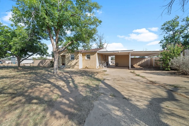 view of front of house featuring a carport