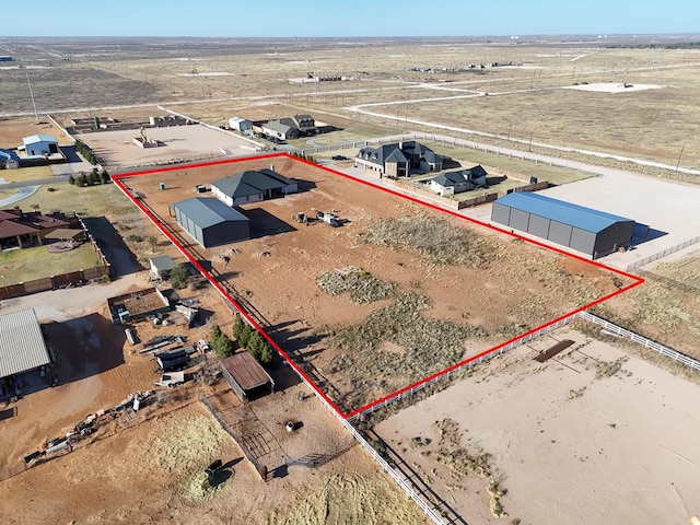 6407 W County Rd 41, Midland, TX 79707 - aerial view of property and surrounding area with property boundaries highlighted and a desert landscape