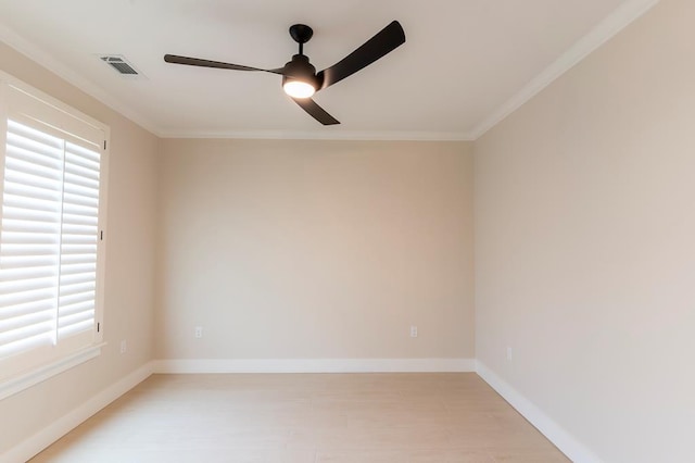 6407 W County Rd 41, Midland, TX 79707 - unfurnished room with a ceiling fan, plenty of natural light, ornamental molding, light wood finished floors, and baseboards
