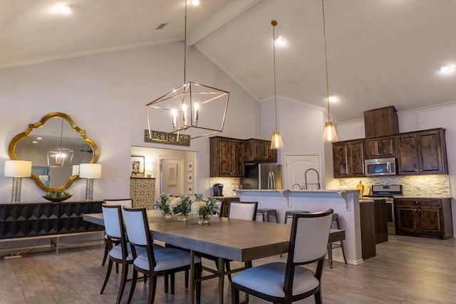 dining room featuring high vaulted ceiling, crown molding, hardwood / wood-style flooring, beamed ceiling, and a notable chandelier