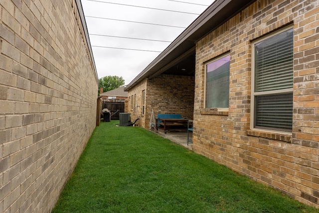 view of home's exterior featuring a yard