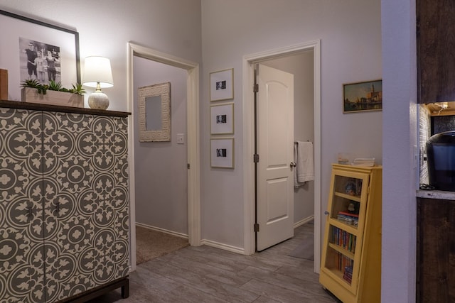 corridor featuring light hardwood / wood-style flooring