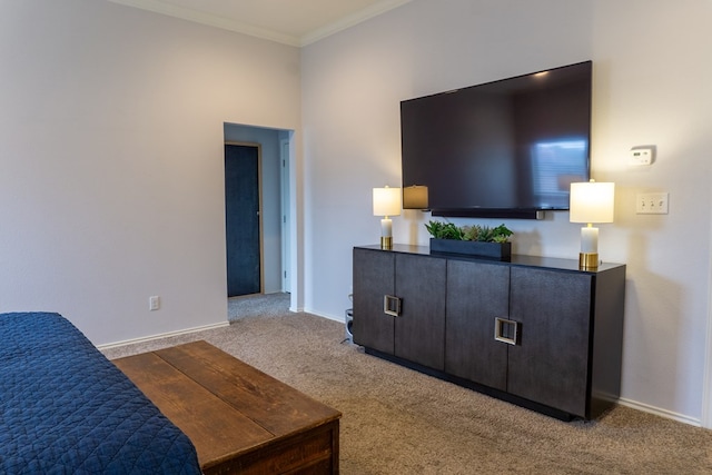 carpeted bedroom featuring ornamental molding