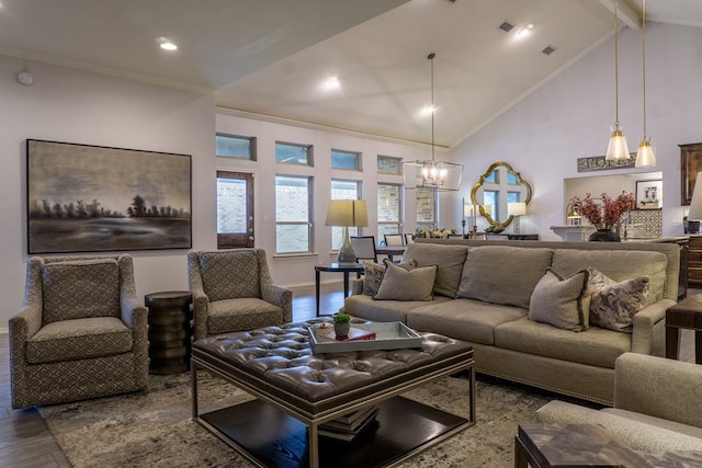 living room with crown molding, an inviting chandelier, high vaulted ceiling, beamed ceiling, and hardwood / wood-style floors