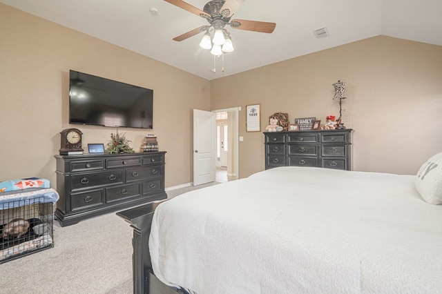 1900 Fringewood Dr, Midland, TX 79707 - carpeted bedroom with visible vents, a ceiling fan, and vaulted ceiling