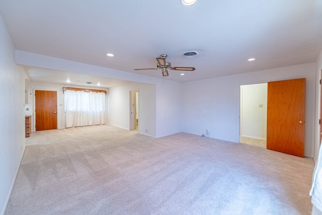 unfurnished room with light carpet, visible vents, recessed lighting, and ceiling fan