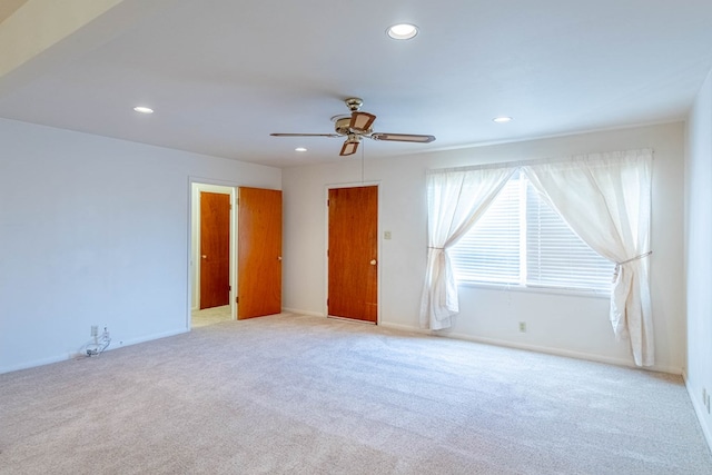 unfurnished room featuring light carpet, recessed lighting, and a ceiling fan