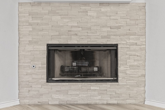 3502 Wedgewood St, Midland, TX 79707 - detailed view of a fireplace and wood finished floors