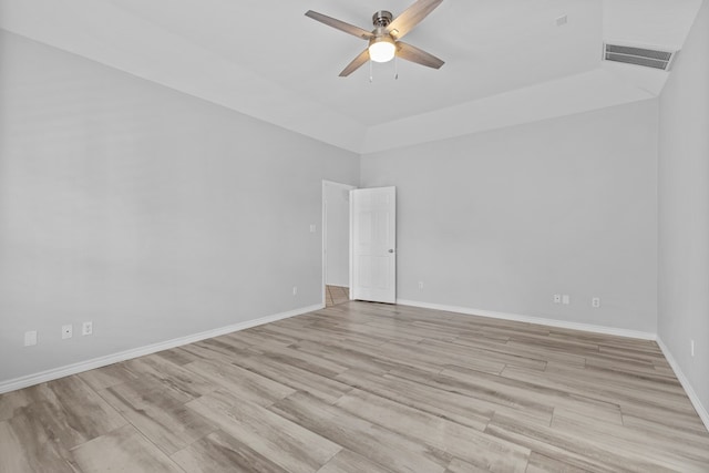 3502 Wedgewood St, Midland, TX 79707 - spare room featuring a ceiling fan, light wood-style flooring, and a towering ceiling