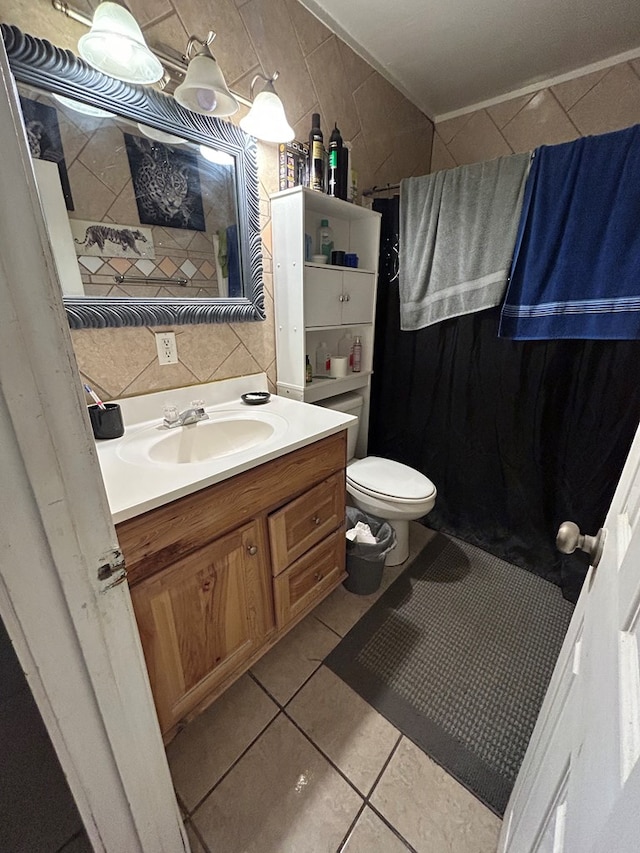 1202 N Gillis Ft, Stockton, TX 79735 - bathroom featuring vanity, tile walls, and tile patterned flooring