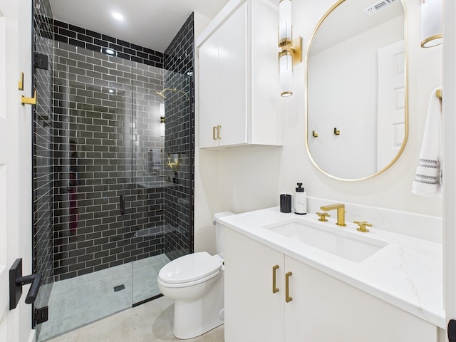 1905 Beaty Rd, San Angelo, TX 76904 - bathroom with a stall shower, toilet, and vanity