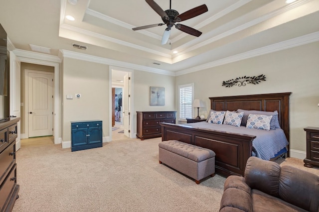 6407 Saddle Horn Ln, Midland, TX 79707 - bedroom featuring a tray ceiling, crown molding, light colored carpet, baseboards, and ceiling fan