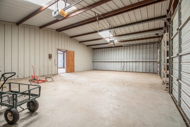 garage featuring a garage door opener