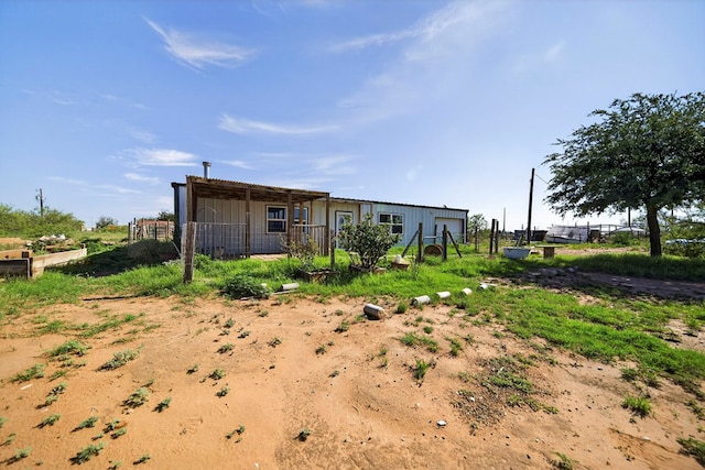 5408 E Loop 250e Unit A, Midland, TX 79705 - rear view of property featuring an outbuilding