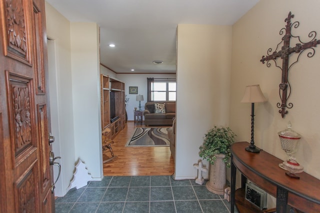 entrance foyer featuring dark tile patterned floors