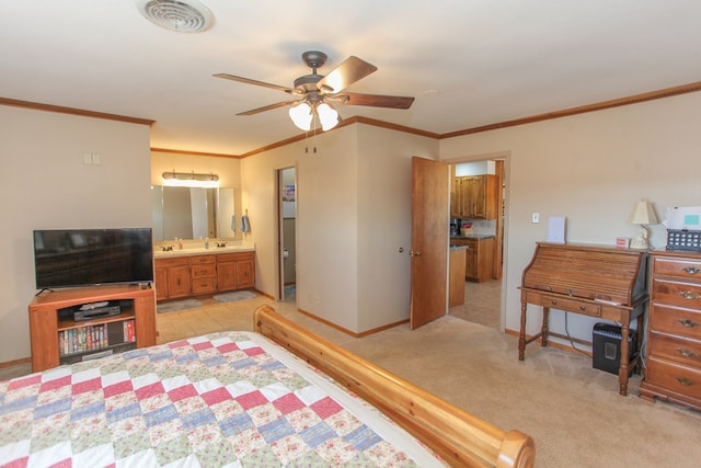 bedroom with crown molding, light colored carpet, ceiling fan, and ensuite bathroom