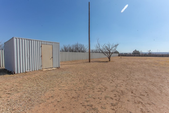 view of yard with a shed