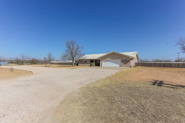 ranch-style house with a garage