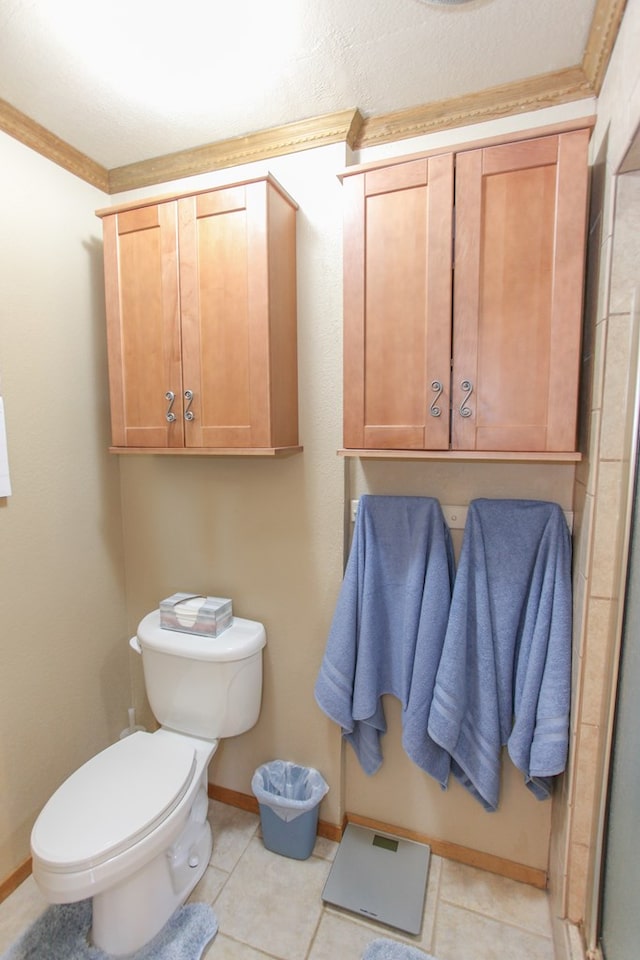 bathroom with tile patterned floors and toilet