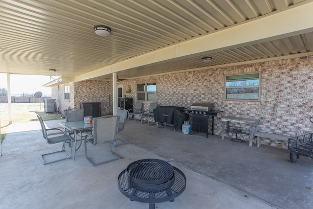 view of patio / terrace with area for grilling and cooling unit