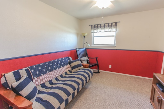 bedroom featuring light carpet and ceiling fan