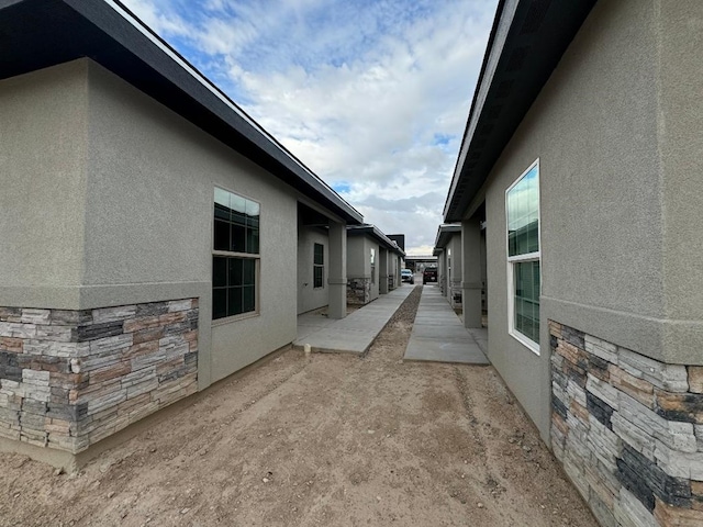 view of property exterior featuring a patio