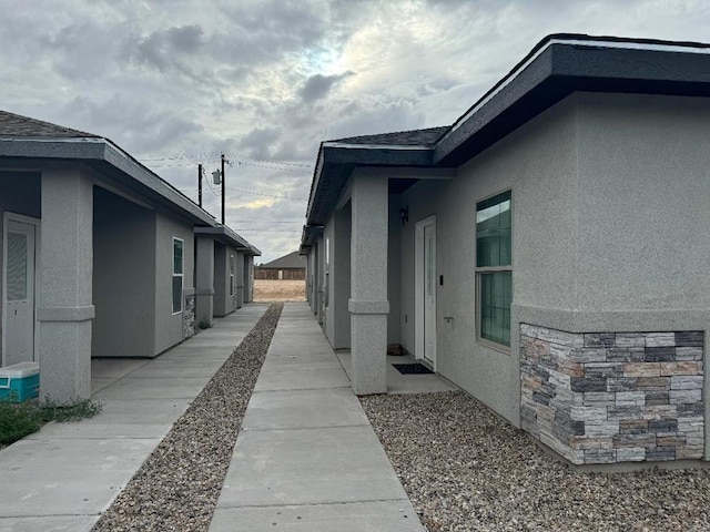 view of home's exterior with a patio area