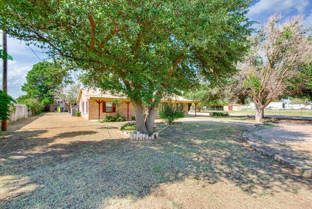 view of yard with fence