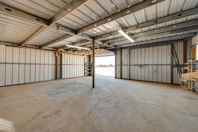 garage featuring metal wall