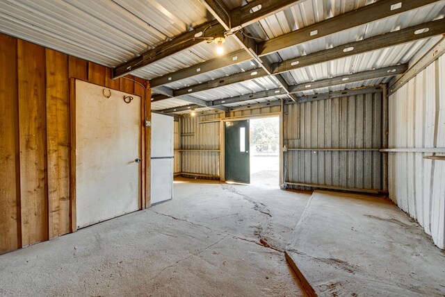 interior space featuring metal wall