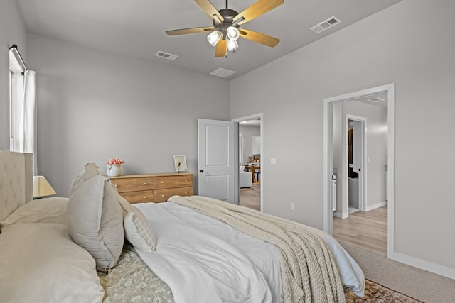 2906 Yellowstone Ct, Midland, TX 79705 - bedroom with light carpet, baseboards, and a ceiling fan