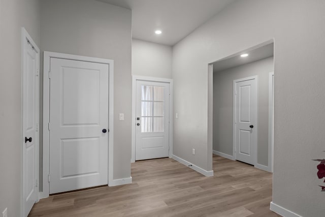2906 Yellowstone Ct, Midland, TX 79705 - foyer featuring light wood-style flooring, baseboards, and recessed lighting