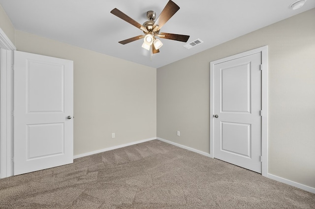 1317 Masquerade Blvd, Odessa, TX 79765 - unfurnished bedroom featuring carpet floors and a ceiling fan