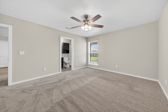 1317 Masquerade Blvd, Odessa, TX 79765 - unfurnished bedroom with carpet flooring, connected bathroom, and a ceiling fan