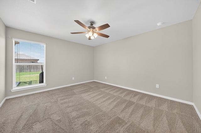 1317 Masquerade Blvd, Odessa, TX 79765 - carpeted empty room with ceiling fan and a smoke detector