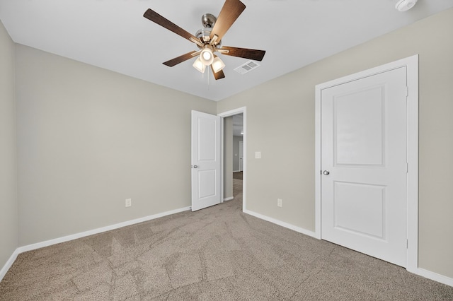 1317 Masquerade Blvd, Odessa, TX 79765 - unfurnished bedroom with carpet and ceiling fan