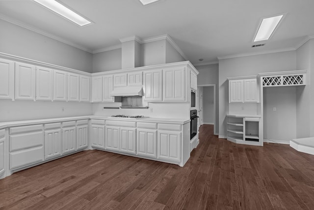 kitchen with oven, dark wood-style flooring, visible vents, white cabinetry, and custom range hood