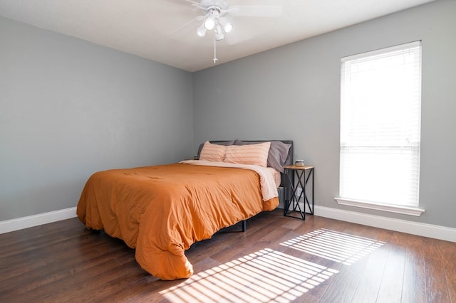 4404 Westminister Dr, Midland, TX 79707 - bedroom featuring baseboards, wood finished floors, and ceiling fan