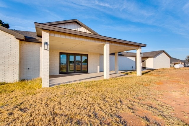 rear view of property with a patio