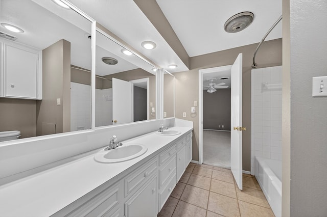 1406 W Pecan, Midland, TX 79705 - bathroom featuring double vanity, tile patterned flooring, a ceiling fan, and bathing tub / shower combination